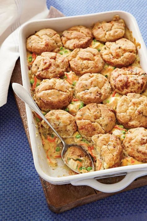 Chicken Pot Pie with Bacon-and-Cheddar Biscuits | The bacon-studded, cheesy biscuit topping is the coup de grace of this particular pot pie. The crowd-feeding, crowd-pleasing 9x13 casserole is one of our signature weeknight dishes. #casserole #recipes #thanksgiving #southernliving Easy Sunday Dinner, Chicken Pot Pies, Sunday Dinner Recipes, Cheddar Biscuits, One Dish Dinners, Chicken Pie, Pot Pies, Bacon Cheddar, Chicken Recipes Casserole