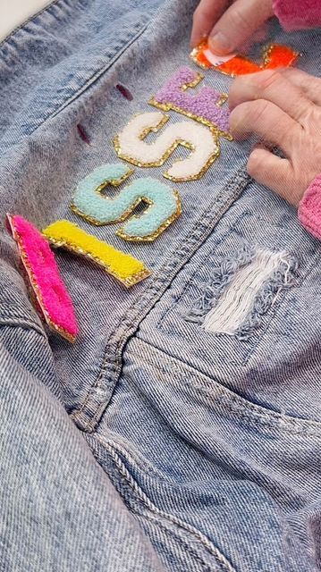 How To Put Patches On Jean Jacket, Iron On Patch Jean Jacket, Diy Bling Jean Jacket, Girls Jean Jacket With Patches, Diy Patch Jean Jacket, How To Sew Patches On Jackets, Patches Jean Jacket, Diy Custom Jean Jacket, Diy Bedazzled Jean Jacket