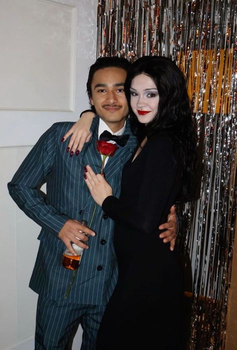 Looking for the best couples halloween costume ideas that will win any contest?? (or are just amazingly creative and fun and cute!), this post shows you 41 amazing Halloween costume ideas for couples to recreate in 2024. #halloweencostume #halloween #halloweencostumeideas #halloweencostumesforwomen #costume #costumeidea #costumesforwomen Morticia And Gomez Costume, Morticia And Gomez Addams Costume, Addams Family Morticia And Gomez, Couples Costume Halloween, Addams Family Halloween Costumes, Celebrity Couple Costumes, Addams Family Halloween, Addams Family Morticia, Tv Show Halloween Costumes