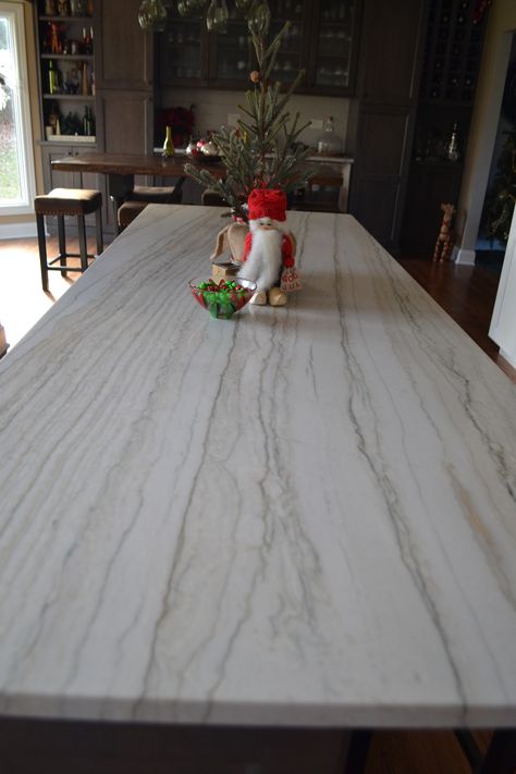 White Macaubas Quartzite is a beautiful addition that works well in both rooms. White Macaubas Quartzite Countertops, Quartzite Countertops Kitchen, White Macaubas Quartzite, White Quartzite Countertops, White Quartzite, Closed Kitchen, Kitchen Granite, House Flipping, Countertop Ideas