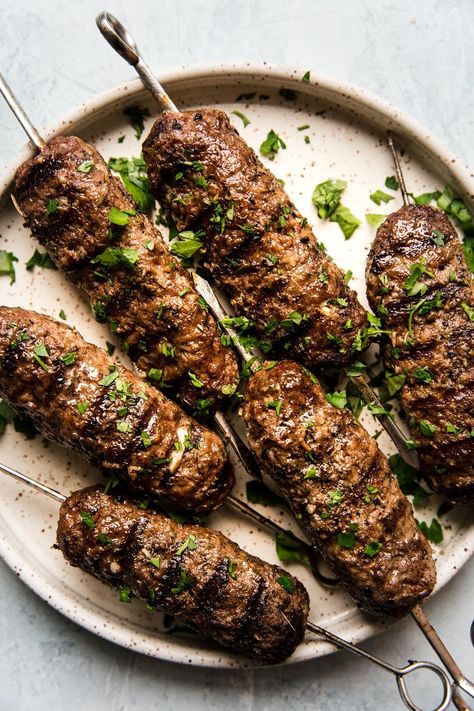 Big, bold herbs and spices make these beef kofta kebabs with tzatziki perfect for a super satisfying centerpiece for a Mediterranean-inspired feast. Kebab Meat Recipe, Beef Koftas Recipe, Lamb Kofta Kebab, Beef Kafta Recipe, Lamb And Beef Kofta, Beef Kebab Recipe, Mediterranean Meat Dishes, Mediterranean Kebab Recipes, Turkish Beef Kebab Recipes