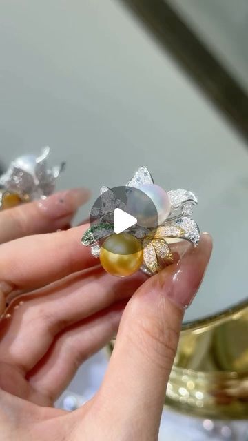 ANNIE CASE FINE JEWELRY on Instagram: "Germinate Flower ring . 
11-12mm Golden & White south sea pearls 
18k Gold . Diamond 💎1.64ct . Sapphire 0.95ct
Dm for inquiries.
@anniecasepearl 
.
.
.
.
.
.
HYL240417WSR62700
#pearl#pearls#pearljewelry#pearllover#lovepearls#pearladdict#finejewelry#jewelryaddict#jewelryaddiction#anniversarygift#giftforher#birthdaygift#pearlring#southseapearls#flowerring#goldpearls#goldensouthseapearl#anniecasepearl" Pearl Cocktail Ring, Sea Pearls, South Sea Pearls, South Seas, Flower Ring, Cocktail Rings, Gold Diamond, 18k Gold, Sapphire