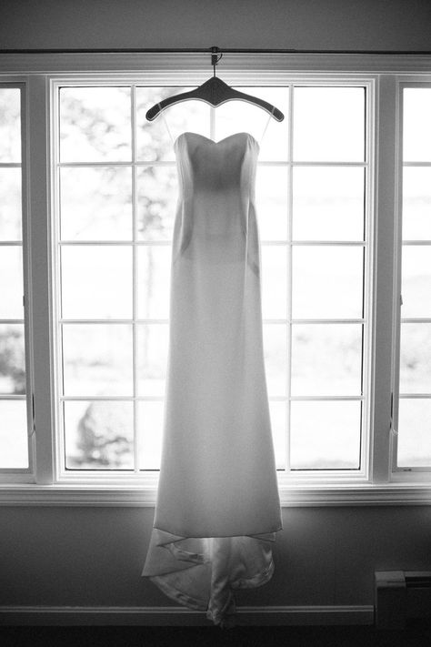 Photo Of Wedding Dress Hanging, Wedding Dress Shoot Photo Ideas, Wedding Dress Photo Ideas Hanging, Picture Of Wedding Dress Hanging, Wedding Dress Photography Ideas, Wedding Dress Hanging In Window, Wedding Photos Dress Hanging, Bride Dress Hanging Photo, Wedding Dress Hanging Photo