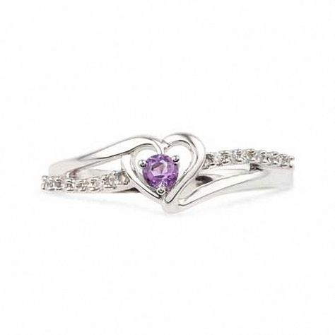 Pledge to love her for a lifetime with this exquisite promise ring. Fashioned in cool sterling silver, this ring features a delicate open heart at its center, punctuated with a single, glistening purple amethyst. A ribbon of shimmering diamond accents sweeps across the style, adding brilliant sparkle. Buffed to a brilliant shine, this ring is certain to take her breath away. Custom made to fit her ring size. Sterling silver rings cannot be resized after purchase. Infinity Promise Rings, Promise Rings Purple, Purple And Silver Jewelry, Promise Rings Pink, Elegant Amethyst Heart Promise Ring, Rings Promise, Amethyst Wedding Ring, Sterling Silver Heart Cut Amethyst Promise Ring, Aesthetic Promise Rings