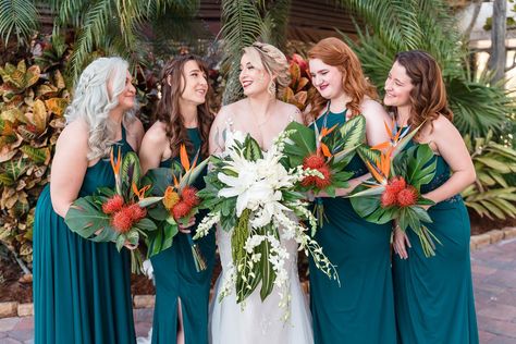 Bridesmaid with tropical wedding bouquet Orlando Wedding Blog, Orange Blossom Bride #orlandoweddings #paradisecove #realwedding #tropicalwedding Tropical Glam Wedding Bridesmaid Dresses, Tropical Wedding Theme Bridesmaid Dresses, Hawaiian Wedding Bridesmaid Dresses, Teal Tropical Wedding, Emerald Green Tropical Wedding, Tropical Wedding Bridesmaids, Tropical Wedding Theme Colors, Tropical Wedding Bridesmaid Dresses, Tropical Bridesmaid Dress