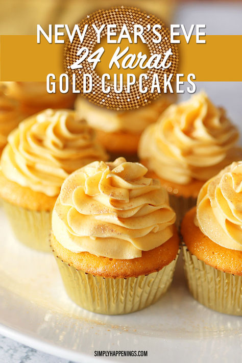 An oval white platter with six gold cupcakes with gold frosting sprinkled with gold edible dust in gold cupcake liners. A banner across the top says New Year's Eve 24 Karat Gold Cupcakes. Black text at the bottom of the photo says simplyhappenings.com Gold Frosting How To Make, Happy New Year Cupcake Ideas, Gold Buttercream Frosting, New Years Cupcake Ideas, Nye Cupcakes, New Years Eve Cupcakes, Golden Cupcakes, Party Recipes Appetizers, New Years Cupcakes