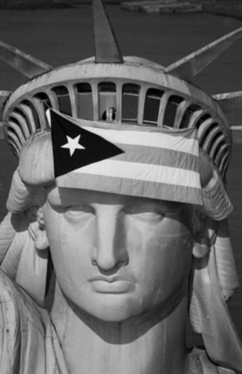 The flag of Puerto Rico flies from the head of the Statue of Liberty after 28 Puerto Rican nationals seized Liberty Island on Oct. 26, 1977. She seems to have a sense of humor about it. Puerto Rico Clothing, Puerto Rican Artwork, Puerto Rican Music, Puerto Rico Trip, Jose Marti, Puerto Rico Food, Puerto Rico History, Puerto Rico Art, Puerto Rican Flag