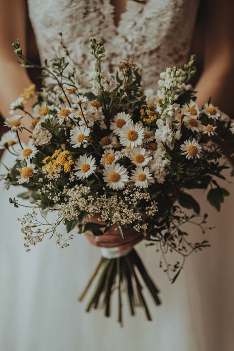 These 44 daisy and wildflower bouquets are a bride’s dream! Add natural beauty and charm to your wedding with these incredible designs. Click to explore now! #bohobride #wildflowers #daisydesign Queen Anne’s Lace Wedding Bouquet, Boho Flower Bouquet Wedding, Mountain Flower Bouquet, Wild Flower Wedding Florals, Cottagecore Wedding Bouquet, Wedding Meadow Flowers, Fairytale Wedding Bouquet, Simple Wedding Flowers Bouquets, Western Wildflower Wedding