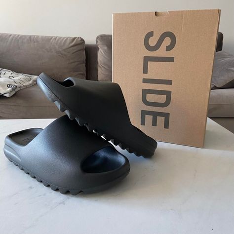 Adidas Yeezy Slide Onyx HQ6448 Sizes 4 - 12 US BRAND NEW Kanye West Deadstock Get a price at https://copapair.com/adidas-yeezy-slide-onyx-hq6448-sizes-4-12-us-brand-new-kanye-west-deadstock/ Kanye West Slides, Onyx Yeezy Slide, Yezzy Slippers Black, Flax Yeezy Slides, All Black Yeezys, Kanye West Adidas Yeezy, Adidas Yeezy Slide, New Kanye, Adidas Slides