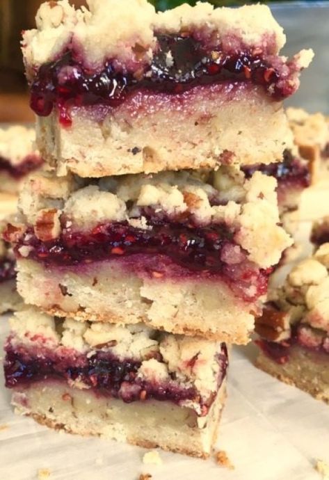 Buttery pecan shortbread layered with raspberry jam. #easydessert Raspberry Shortbread Bars, Easy Blueberry Crumble, Raspberry Shortbread, Oat Crumble Topping, Blueberry Crumble Bars, Pecan Shortbread, Blueberry Filling, Crumb Bars, Shortbread Bars