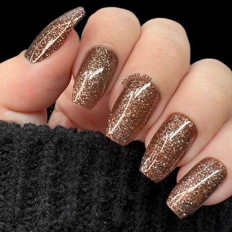 Cocktails and nails bring a glam chic vibe! Muse (P140) is a semi sheer dark brown with silver metallic glitter. With glimmering effect, this polish gives a beautiful sparkling shine to your nails.• GLITZ & GLAM: A semi sheer dark brown with silver metallic glitter for a glam chic vibe.• ﻿NAILED IT: Our regular nail polishes allow you to explore your creativity with special effects and colors that are beautiful for all-over coverage.• 5-FREE AND CRUELTY-FREE: All of our polishes are only tested Gold Colored Nails, Burgundy Glitter Nails Acrylic, Tan And Glitter Nails, Brown Nails With Gold Glitter, Dark Gold Nails, Nails With Rust Color Dress, Taupe Glitter Nails, Glitter Nails Brown, Sparkly Tan Nails