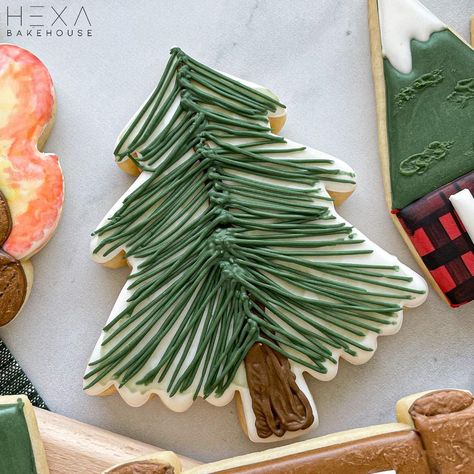 Buttercream Christmas Tree Cookies, Pine Tree Cookies Decorated, Christmas Tree Royal Icing Cookies, Pine Tree Cookies, Tree Cookies Decorated, Pinecone Cookies, Christmas Tree Sugar Cookies, Tree Sugar Cookies, Mountain Cookies