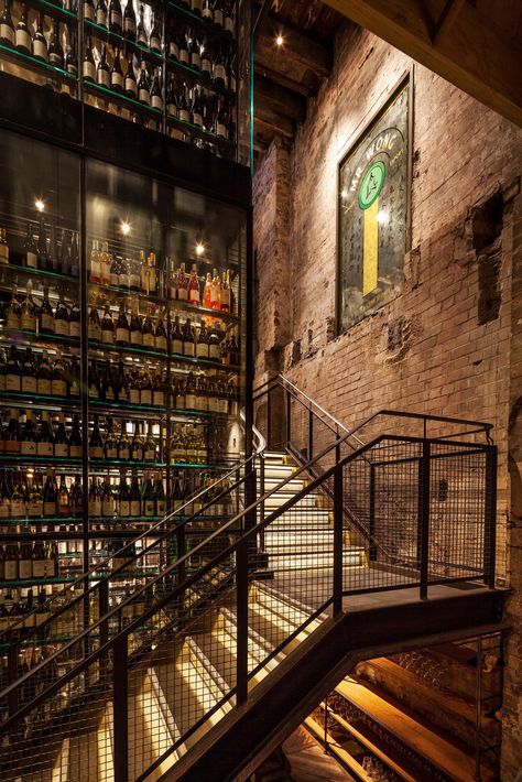 7 Restaurants with Intoxicating Wine Displays Industrial Bar, Wine Display, Lan Can, Bar Interior, Bar Design Restaurant, Restaurant Interior Design, Wine Room, Staircase Design, Stairs Design