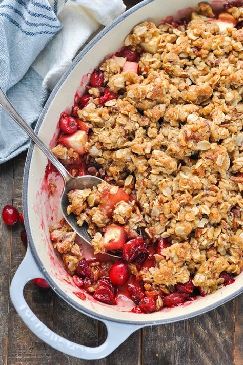 This Old Fashioned Cranberry Apple Crisp is the perfect easy dessert recipe for Thanksgiving, Christmas or any other special gathering this season! The sweet and tart fruit is topped with a buttery oat crumble for the ultimate decadent treat -- with just 10 minutes of prep! Apple Recipes Easy | Apple Recipes Dessert | Thanksgiving Dessert Ideas | Christmas Ideas Cranberry Apple Crisp With Oatmeal, Apple Cranberry Crisp Recipe With Oats, Cranberry Apple Casserole, Cranberry Crisp Recipes, Cranberry Apple Dessert Recipes, Apple Rhubarb Crisp, Apple Recipes Dessert, Apple Cranberry Crisp Recipe, Cranberry Apple Crumble