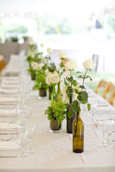 8 Wedding Wine Bottle Centrepiece Decor Ideas | Just Wine Wine Bottle Wedding Decor, Wine Bottle Wedding Centerpieces, Greenery Wedding Centerpieces, Wine Bottle Vases, Wine Bottle Centerpieces, West France, Wedding Wine Bottles, Bottle Centerpieces, Mint Mojito