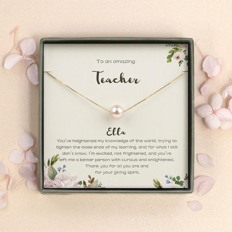 "This delicate teacher necklace features a lovely pearl, hanging from the delicate sterling silver or gold filled chain. Each pearl necklace in this collection comes with a memorable quote printed on a wish card. It makes a beautiful and thoughtful appreciation gift for your teacher. The message shown reads: Header: To an amazing Teacher Body: You've heightened my knowledge of the world, trying to tighten the loose ends of my learning, and for what I still don't know. I'm excited, not frightened Affordable Gold Bracelet For Teacher Appreciation, Teacher Necklace Gift, Customizable White Bracelets For Teacher Appreciation, Cheap Personalized Jewelry For Teacher Appreciation, Graduation Gift For Teacher, Adjustable Pearl-embellished Necklace For Gifts, Teacher Necklace, Card For Teacher, Teacher Graduation Gifts