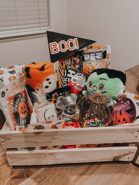 Such a fun and simple tradition to start with your kids. Most of the items are from the dollar bin at target and walmart. You can add books, halloween candy, pajamas, stickers, plushies, small blankets, etc 🎃 Dollar Tree Halloween Basket, Simple Boo Basket, Boo Basket From Dollar Tree, Dollar General Boo Basket, Boo Basket Blanket, Soda Cakes, Plastic Canvas Halloween Basket Patterns, Cake Gift Basket, Books Halloween