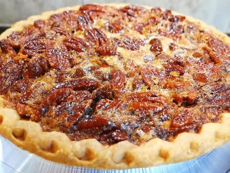 Easy Chocolate Chip Pecan Pie Recipe - NewsBreak Homemade Caramel Candy, Chocolate Chip Pecan Pie, Emeril Lagasse Recipes, Pecan Pie Bars Recipe, Apple Bread Recipe, Pecan Pie Easy, Pie Bar Recipes, Avocado Toast Recipe, Chocolate Pecan Pie