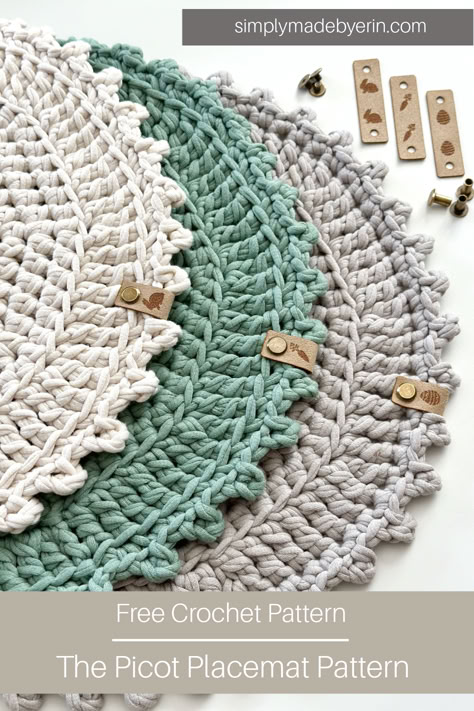 Pinterest cover photo featuring the Picot Placemat crochet pattern.  There are three placemats worked up in cream, green, and grey yarn, stacked on top of each other sitting on a white background.  Each placemat has small leather Easter themed tags screwed on with bronze Chicago screws. Crocheted Placemats Round, Crochet Table Doily Free Pattern, Crochet Circular Placemat, Free Crochet Table Mat Patterns, Crochet Patterns Placemats, Crochet Patterns For Placemats, Place Mat Crochet Free Pattern, Crochet Napkins Patterns Free, Crochet Pattern For Placemats