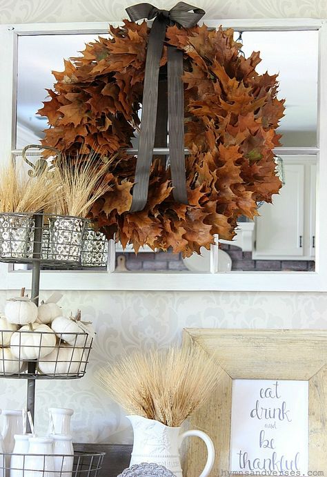 How to make a Fall Oak Leaf Wreath using real leaves found in your yard. This is an easy and inexpensive, yet gorgeous wreath! Oak Leaf Wreath, Fall Entryway Decor, Small Pine Cones, Easy Fall Wreaths, Fall Leaf Wreaths, Garden Globes, Straw Wreath, Fall Entryway, Spooky Fall