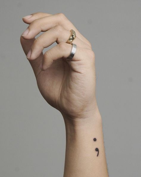 22 Cool And Powerful Small Tattoos With Deep Meaning Small Tattoos With Deep Meaning, Tattoo On The Side, Semicolon Wrist Tattoo, Semicolon Tattoo Ideas, Tattoo Ideas With Meaning, Tattoos With Deep Meaning, Small Star Tattoos, Circle Tattoos, Semicolon Tattoo