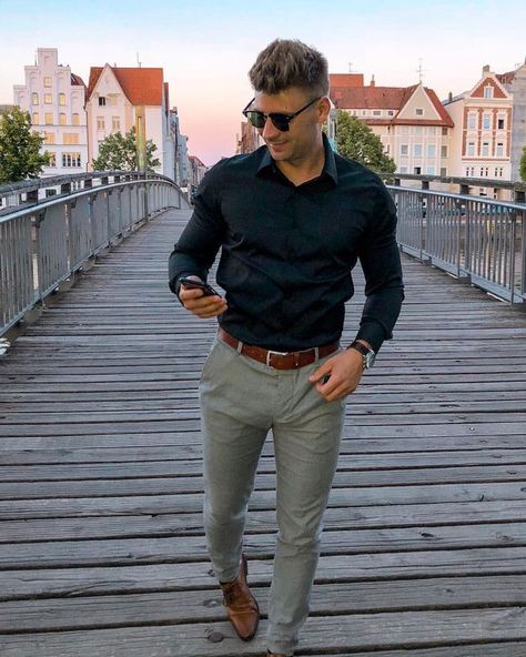 Simple business casual combo inspiration with a black button up shirt sunglasses watch brown leather belt military green chinos brown dress shoes #businesscasual #summeroutfits #menswear #mensfashion #menstyle #menattire #mensapparel Spring Outfits Men Casual, Grey Pants Brown Shoes, Brown Shoes Outfit, Grey Chinos Men, Chinos Men Outfit, Mens Brown Dress Shoes, Brown Shoes Men, Shirt Outfit Men, Black Button Up Shirt