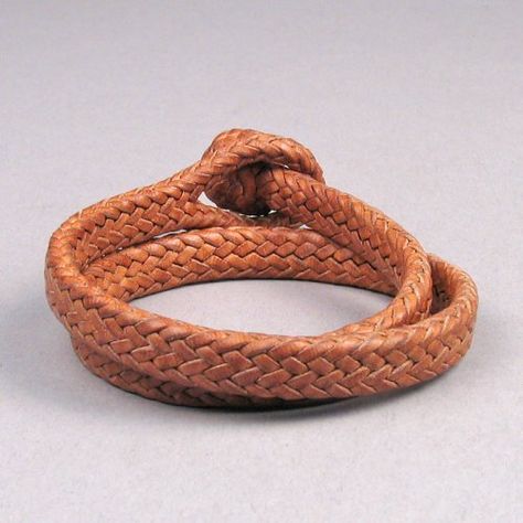 Natural Woven Leather Bracelet Item: HJ5129 Material: Woven leather Size: 13 1/2" length Period: contemporary Origin: Mixtec Artist: Aaron Lopez Bautista Price: $280.00 Woven Leather Bracelet, Traditional Woven Bangle Bracelet, Traditional Woven Natural Jewelry, Southwestern Style Handwoven Bracelets, Brown Leather Hand-tooled Bracelets, Mid Century Furnishings, Native American Tribes, Braided Leather, Native American Art