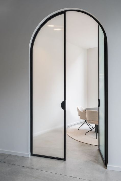 #architecture #interiorarchitecture #office #glass #door #steel #inspiration #chair #meetingroom #carpet #table Decorative Glass Door, Glass Steel Door, Indoor Glass Wall With Door, Indoor Door Design Modern, Metal Office Doors, Arch Crittal Doors, Glass Indoor Doors, Arched Glass Door, Glass Arch Door