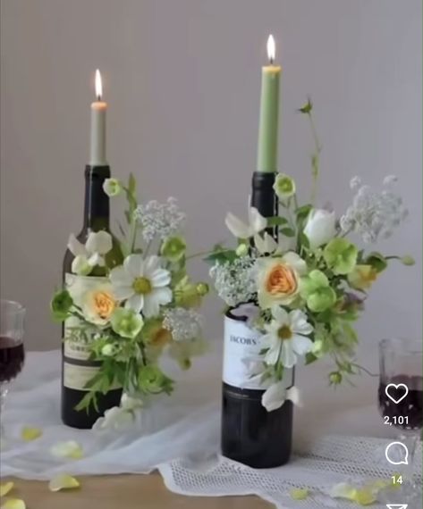 Wine Bottle Flower Arrangements Gift, Wine Bottle Candle Holders Wedding, Decorated Wine Bottles For Wedding, Floral Wine Bottle, Wine Flower Arrangements, Wine Bottle Crafts Wedding, Bottle Floral Arrangements, Wedding Wine Bottle Decor, Wine Bottle Bouquet Diy