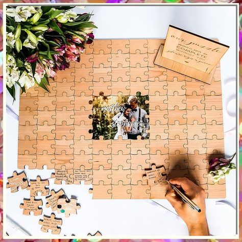 Looking for unforgettable wedding guest book ideas? Check out our curated list of 8 unique options to capture cherished memories. From personalized puzzles to fingerprint trees, these creative alternatives will make your special day even more memorable. Say goodbye to traditional guest books and hello to a truly one-of-a-kind keepsake. Explore now! Unique Things To Have At Your Wedding, Wedding Reception Ideas On A Budget, Creative Guest Book Ideas, Guest Book Decor, Puzzle Guest Book Wedding, Puzzle Guest Book, Wedding Puzzle, Wood Guest Book Wedding, Rustic Wedding Decorations