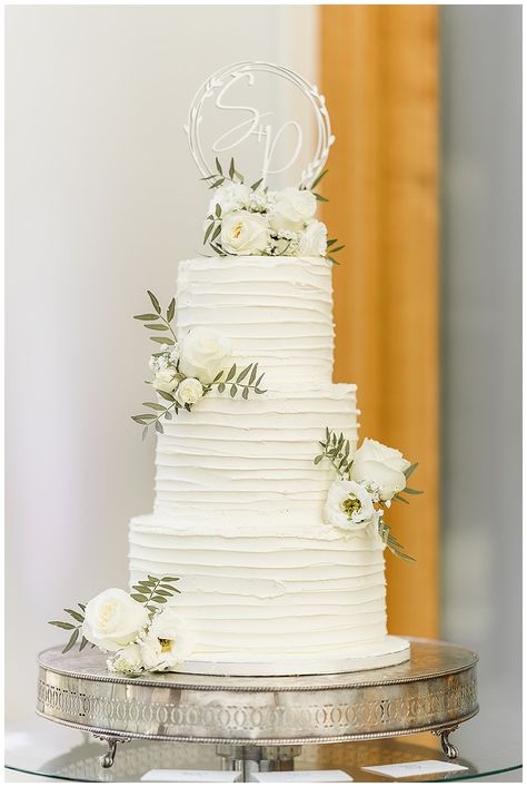 A gorgeous three tier wedding cake adorned with fresh  flower clusters, we love working with suppliers as local florists to Botleys mansion, Surrey 3 Tier Wedding Cake With Topper, Three Tier Wedding Cake With Flowers, Three Tiered Wedding Cake, Botleys Mansion, Three Tier Wedding Cake, 3 Tier Wedding Cakes, Gorgeous Wedding Cake, White Wedding Cake, Wedding Cakes With Flowers