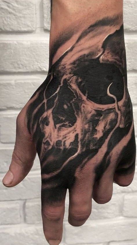 Tattoo Skulls Men, Skull Tattoos For Men Hand, Skull Tattoos Hand Men, Realism Hand Tattoos For Guys, Skull Headress Tattoos, Skull Tattoo For Hand, Best Cover Up Tattoo Ideas For Men, Dark Finger Tattoos Men, Half Skull Hand Tattoo