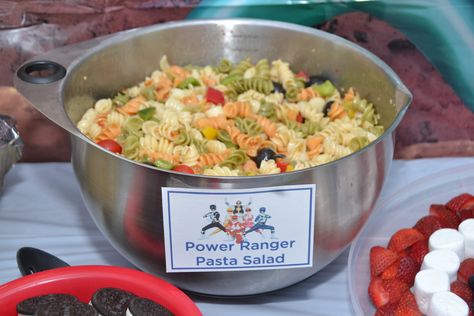 Power Rangers Pasta Salad---  use colored pasta and add ingredients in the Power Rangers colors. Black olives, red, yellow, and green peppers, white cheese cubes, red cherry tomatoes and chopped onions. Turkey Birthday Party, Power Rangers Dino Charge Birthday, Superhero Birthday Party Food, Superhero Party Food, Superhero Birthday Party Ideas, Party Planning Food, Birthday Party Food Ideas, Power Ranger Birthday Party, Marvel Birthday