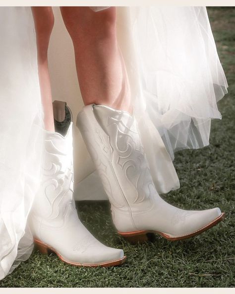 Step into matrimonial bliss with these exquisite white leather wedding boots! Crafted for the modern bride or groom, these boots add a touch of sophistication and style to your special day. Say "I do" in fashion-forward footwear that exudes elegance and charm.

#corralboots #whiteboots #weddingboots #outbacktraders #outbacktradersau #bride White Cowgirl Boots Wedding, Wedding Cowboy Boots For Bride, White Wedding Boots, Cowgirl Boots Wedding, Cowgirl Lifestyle, Wedding Cowboy Boots, White Cowgirl Boots, Wedding Boots, Corral Boots