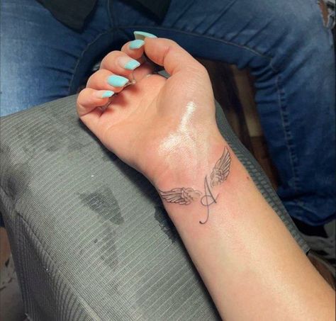 Angel Wing Wrist Tattoo, Wing Tattoos On Wrist, Angel Tattoo For Women, Angel Wing Tattoo, Tattoos For Dad Memorial, Tattoo Angel, Remembrance Tattoos, Cute Hand Tattoos, Pretty Hand Tattoos