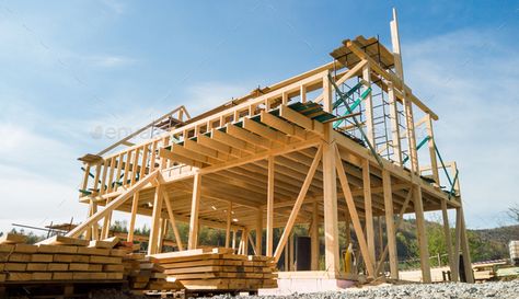 Framing of a new wooden house under construction by leszekglasner. Framing of a new wooden house under construction #Sponsored #wooden, #Framing, #house, #leszekglasner Barndominium Cost, House Under Construction, Build Your House, Cheap Houses, Cob House, Prefabricated Houses, Ranch Style Homes, Level Homes, Building A New Home