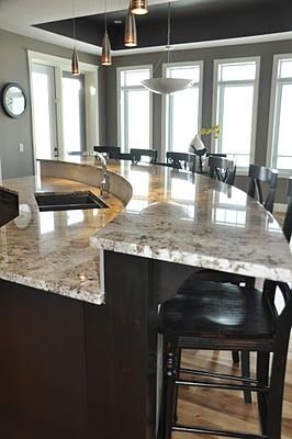 curved bar: but swap the sink for the stove :) Diamond Island Kitchen, Curved Kitchen Island With Sink, Kitchen Bar Island Ideas, 2 Tier Kitchen Island With Seating, 2 Level Kitchen Island, Two Level Kitchen Island, Kitchen Island Raised Bar, Curved Kitchen Island Ideas, Curved Island