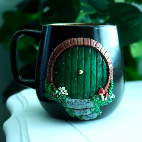 Amazing Polymer Clay Mugs and Earrings by TheCloverPatchClayCo | Of Hobbits, Halloween and More! - The Beading Gem's Journal Books And Tea, Hobbit Door, Cottagecore Gifts, Clay Mugs, Mug Handmade, Round Door, Ceramics Pottery Art, Ceramics Ideas Pottery, Stoneware Mugs