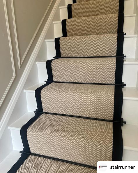 Definitely one of our best sellers! Fibre Flooring Chalk herringbone with black border @fibreflooring @jaspa_binding_tapes stair runner and landing carpet. Black jubilee stair rods @stairrods_uk #stairs #stairrunner #carpet #stairrods #stairrunners Beige And Black Stair Runner, Stair Runner Carpet On Dark Wood, Grey Stair Runner With Black Edge, Black Stair Rods, Carpet Runner On Stairs Brass Rods, Stair Runner With Border, Wooden Stair Runner, Stair Runner Black Trim, Stair Carpet Runner With Rods