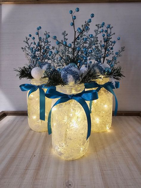 Blue and Silver Christmas Mason Jar With Fairy Lights, Holiday Table Centerpiece, Party Event Decor, Winter Wedding, Seasonal Gift - Etsy Winter Wonderland Christmas Centerpieces, Christmas Ball Centerpieces, Winter Wonderland Party Theme Decor Table Decorations, Blue Christmas Theme Decorating Ideas, Blue And Silver Table Decorations, Winter Wonderland Centerpieces Diy Table Decorations, Blue White Silver Christmas Decor, Blue Centerpieces Wedding, Blue Xmas Decorating Ideas