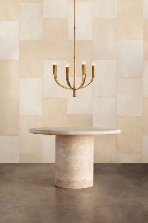 Kelly Wearstler Furniture - This pedestal table is carved from a hand selected travertine block. The soft bull nose edge of the table top creates a unexpected contrast to the raw travertine material. This table in 48" and 60" diameters verifies the simplicity of the design through the seamless connection of the top and base. The final product is honed, enhanced and sealed. Brick Villa, Travertine Pedestal, Kelly Wearstler Lighting, Small Chandeliers, Round Bar Table, Dark Windows, Shoe Molding, Small Fountains, Architectural Design House Plans