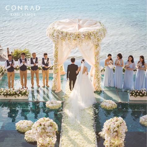 Exchange #wedding vows on the idyllic tropical #beach, high above the lush forests and white beaches of #KohSamui or over-the-water at our infinity-edge #pool with breathtaking view of the Gulf of #Thailand! For more information about the #weddingpackage, visit conradkohsamui.com #StayInspired #ConradHotels #Kohsamui #ConradKohSamui #Samui Water Theme Wedding, Infinity Pool Wedding, Indian Beach Wedding, Wedding Stairs, Wedding Aisles, Outdoor Beach Wedding, Wedding Day Wishes, Edge Pool, Wedding Water