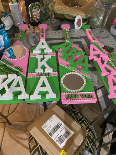 Aka Welcome Sign, Aka Paddles Alpha Kappa Alpha, Aka Decorated Room, Aka Staff Stick Ideas, Aka Probate Gifts Room, Aka Gift Ideas, Aka Room Decorations, Paddle Sorority Ideas, Aka Paddle Ideas