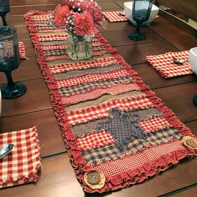 This super simple and super quick project is created using five homespun fat quarters , two rolls of our 2" ruffled trim , and some yo-yos and buttons .  You can download a FREE copy of the pattern... Primitive Table Runners, Quilt Table Runner, Rag Quilt Tutorial, Rag Quilt Patterns, Yo Yos, Quilted Table Runners Patterns, Homespun Fabric, Table Runner And Placemats, Table Runner Pattern