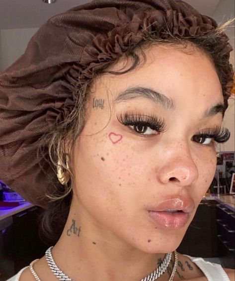 India Love Face Tattoos, Lil Face Tattoos, Love Heart Face Tattoo, Girls With Face Tattoos, Fake Face Tattoo, Cute Face Tats, Heart Face Tattoo, Pretty Face Tattoos, Under Eye Tattoo