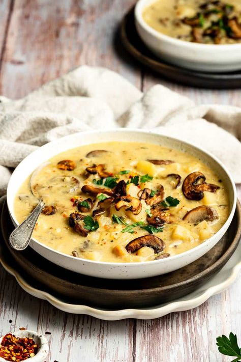 Warm up with a bowl of comforting Mushroom Potato Soup. Hearty potatoes, tender mushrooms, and fragrant herbs in a creamy broth. Mushroom And Potato Stew, Mushroom Potato Chowder, Potato And Mushroom Soup, Potato Mushroom Soup, Mushroom Potato Soup, Mushroom Potato, Potato Mushroom, Soup Hearty, Best Potato Soup