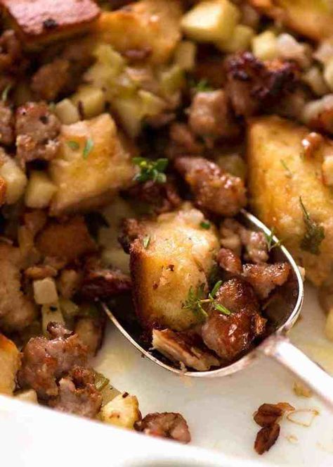 Close up spoon digging into Sausage Stuffing Sausage Stuffing Thanksgiving, Italian Sausage Stuffing, Stuffing With Apples, Sourdough Stuffing, Best Stuffing Recipe, Sausage Stuffing Recipe, Best Stuffing, Slow Roasted Italian, Sausage Stuffing