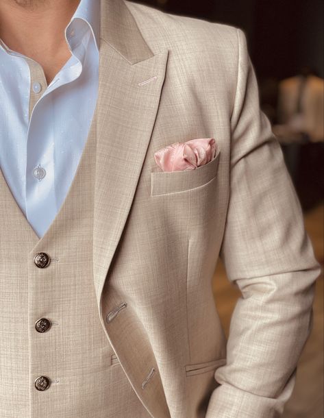 Sandy Beige Mens Wedding suit with pink pocket square. Antique Metal Button. White Polka Shirt with matching collar line Tan And Pink Suit Men, Beige And Pink Suit Men, Beige Suit With Pink Tie, Tan Suit Pink Shirt, Beige Suit Pink Tie, Wedding Suite Man, Champagne Suits For Men Wedding, Kali Outfit, Cream Suit Men Wedding