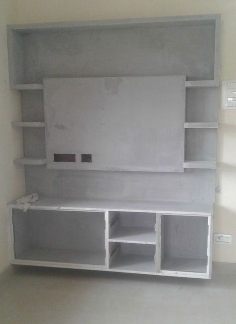 Cement TV Shelf Designs Wall Tv Unit Design Cement, Cobord Works Tv, Cement Tv Cupboards, Granite Tv Unit Design, Tv Unit Design Cement Work, Cement Bookshelf, Cobord Works, Tv Wall Design Cement Work, Tv Unit Design Modern With Cement