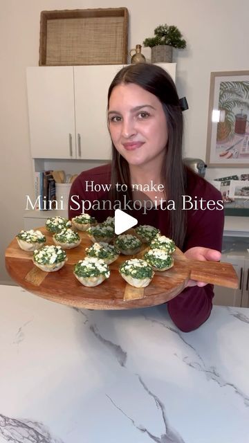 Sierra Georgitsis on Instagram: "Mini spanakopita bites🇬🇷 Recipe below👇

Ingredients
8 oz fresh spinach, finely chopped
1.5 tsp salt
2 tbsp olive oil
2 green onions, thinly sliced
2 tbsp fresh parsley, finely chopped
1.5 tsp fresh dill, finely chopped
4 oz feta, crumbled (+ more for topping)
1 egg, beaten
1 tsp pepper
1 package frozen phyllo shells (15 total)
 
Instructions
1. Preheat oven to 350 F. Spray a baking sheet with nonstick spray.
2. Chop washed spinach and place in a large bowl. Add 1.5 tsp salt and rub together using your hands. Set aside.
3. Slice green onions, chop fresh parsley, fresh dill, and set aside. In a separate small bowl, lightly beat an egg.
4. Using your hands, squeeze the water out of the spinach and carefully transfer to a separate mixing bowl.
5. Add 2 tbsp Spanakopita Bites, Frozen Spinach Recipes, Phyllo Shells, Spinach Pie, Spinach Recipes, Frozen Spinach, Holiday Appetizers, Easy Appetizer Recipes, Fresh Dill